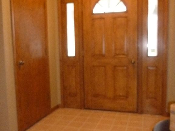 Guests enter into a lg foyer..