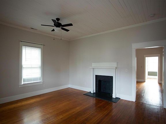 Living room from front door, looking into dining room.