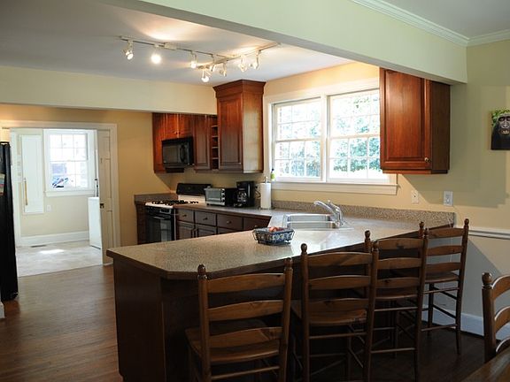 Dining flows to Kitchen