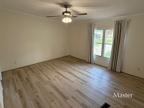 Spacious master bedroom with private en suite and large closet