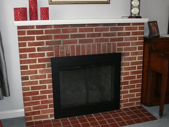Offers gas fireplace w/brick hearth