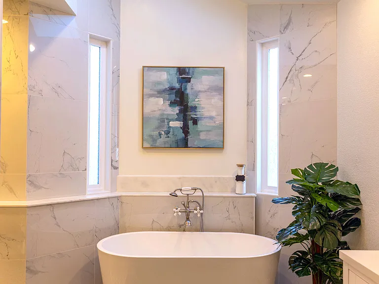 Bathtub sits below skylight
