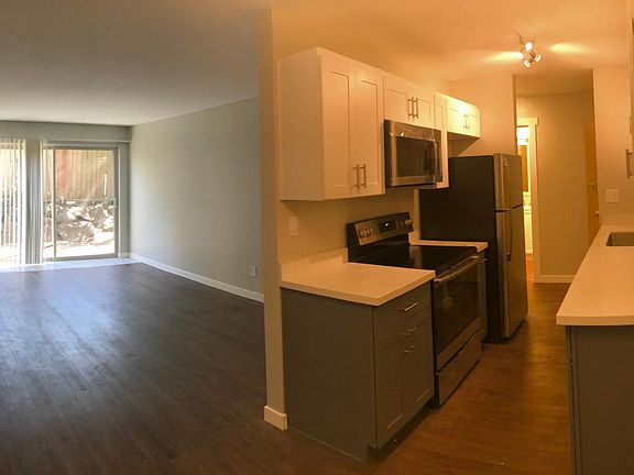 Living, dining, and kitchen area