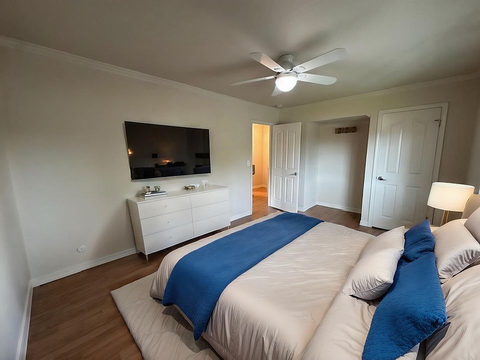 Primary bedroom with walk-in closet