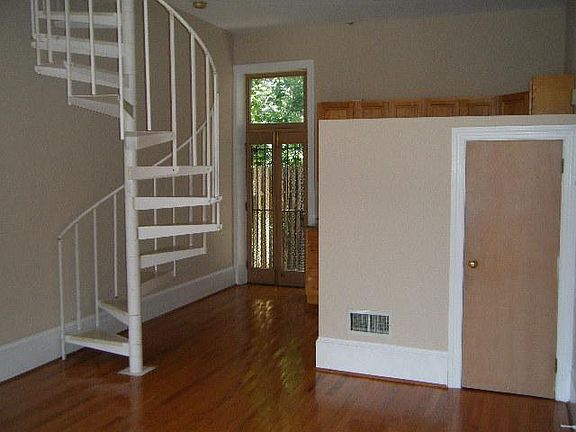 Stairs to den and bedroom. Note:furniture does not have to be moved up spiral stairs.