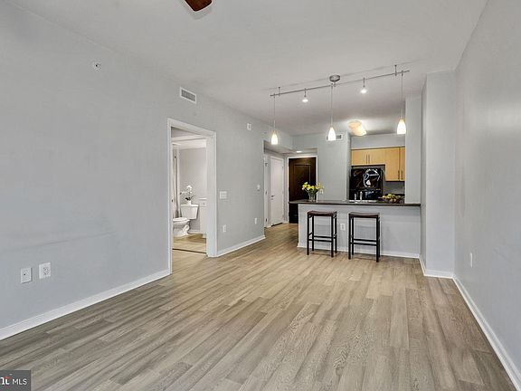 5th image of 7710 Woodmont Ave APT 302