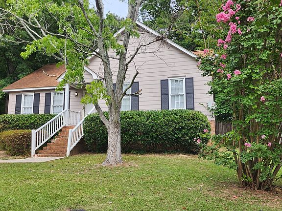 Beautiful Crepe Myrtle in front side of yard.