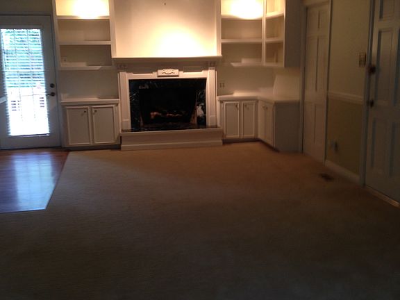 DEN FIREPLACE , BOOKCASES