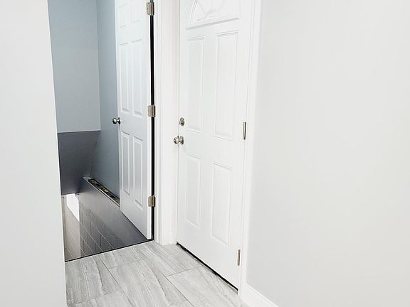 Side Entrance off of dining area. Basement entrance