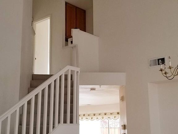 living room, view to upstairs