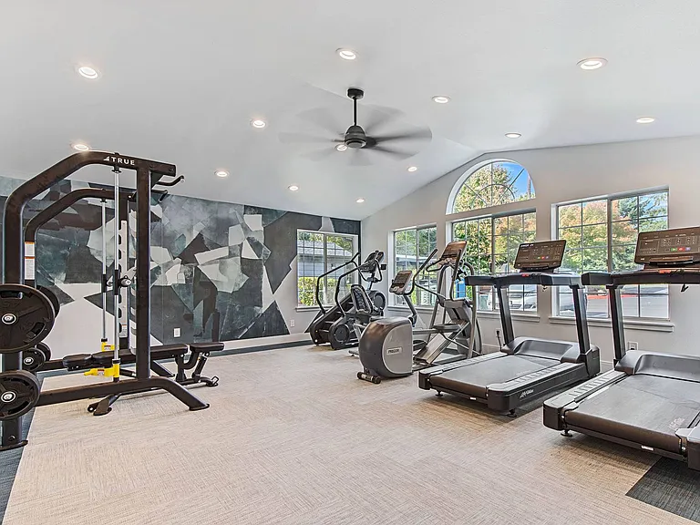 Stay active and energized in a light-filled fitness center with premium cardio and strength equipment
