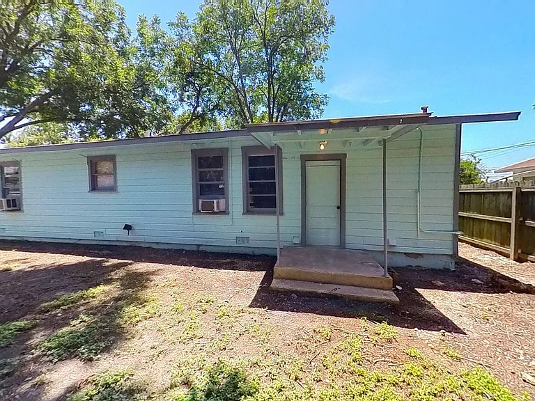 Backyard view of exterior