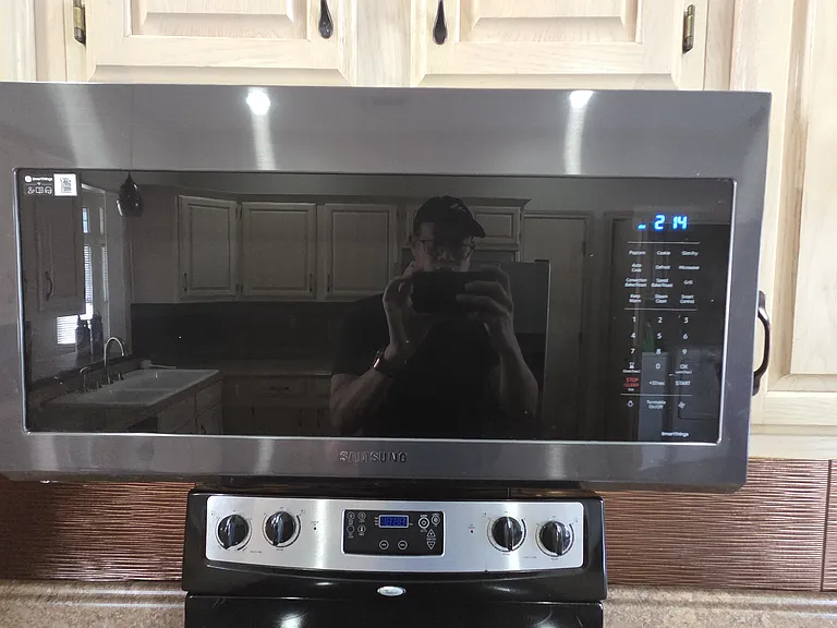 Brand new Samsung microwave with convection feature.
