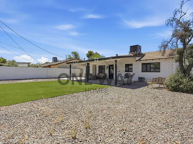 8702 E Sheridan St — Photo 27