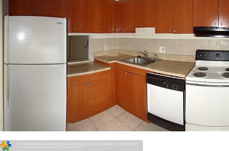 1st image of 7897 Golf Circle Dr APT 312