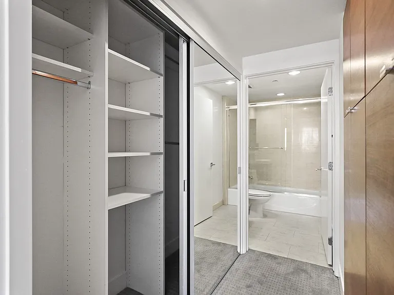 Bathroom, Mirrored Closet, and Built-In Cabinet Storage