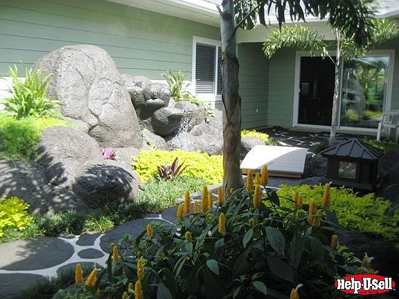 Colors galore greet you at the entrance w/a symphony of tropical plants!
