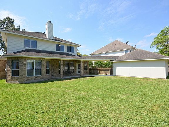 What an awesome backyard! This home backs up to the 6th hole of the Windrose Golf Course, providing 