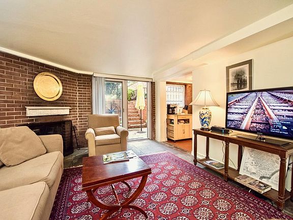 Indoor Living Room opens to south-facing patio