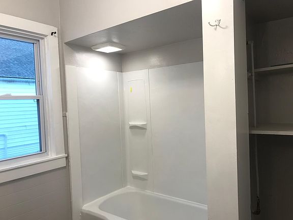 Tub with a light and fan