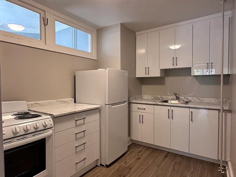 renovated kitchen with transom adding natural sunlight