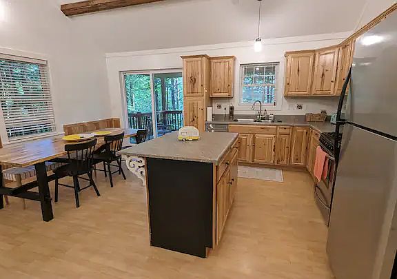 Kitchen with fridge and dishwasher.