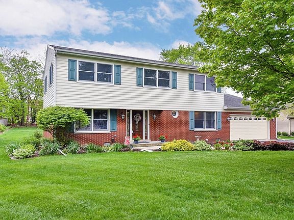 Maintenance-free exterior features Hardie Board siding and brick.
