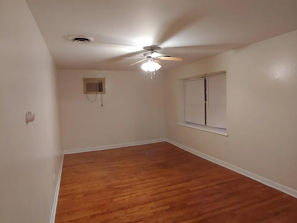 large living room with hardwood floors