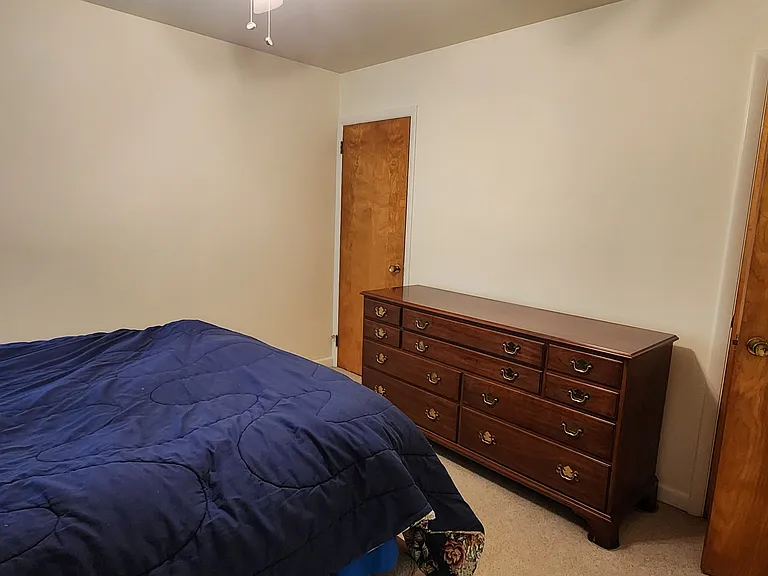 bedroom with 2 closets
