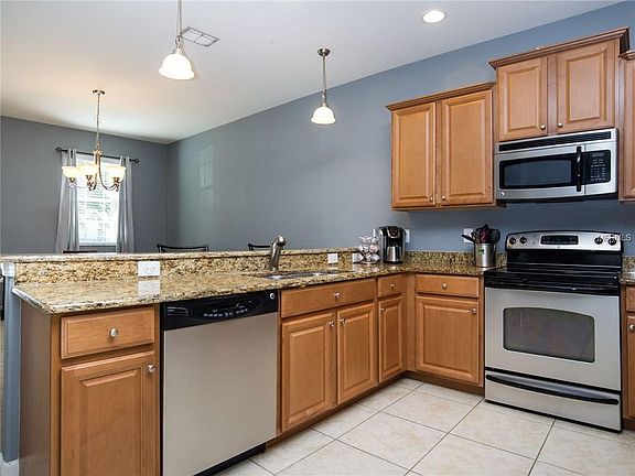 4th image of 15411 Avenue Of The Arbors