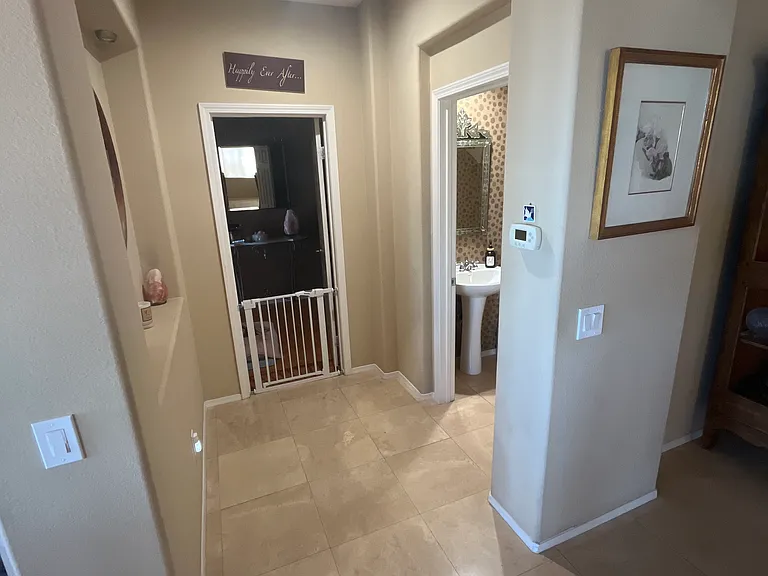 Hallway to owners room and shared bathroom