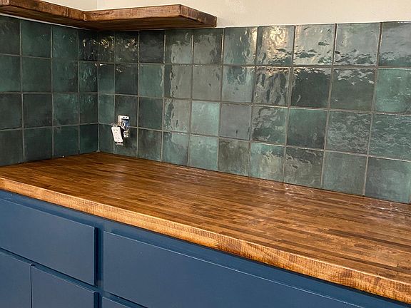 Bedrosian's Cloe tile with maple butcher block.