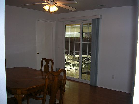 dining room with doors to private patio