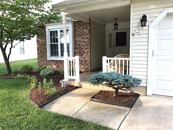 House front, covered porch