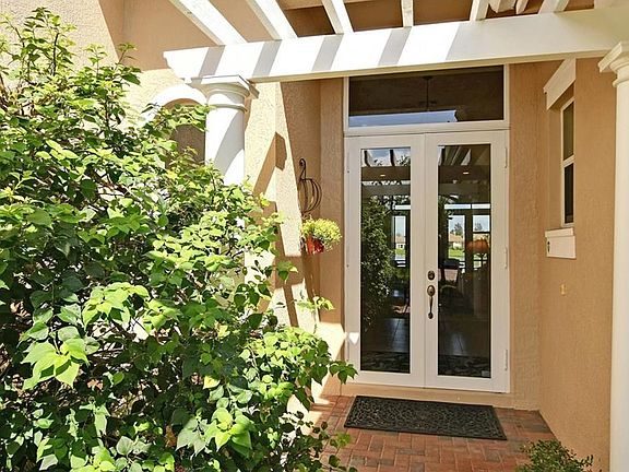 Lush Landscaped Entry.