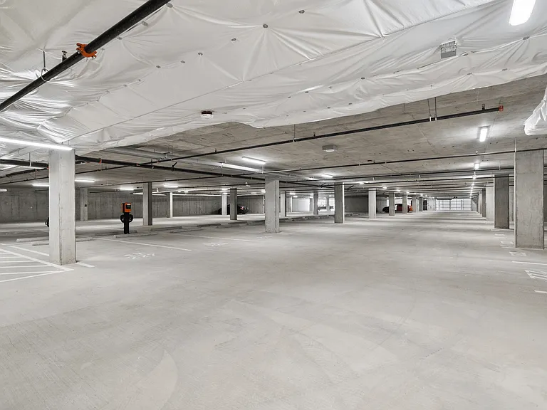 Spacious resident parking garage at Fryar Flats Apartments.