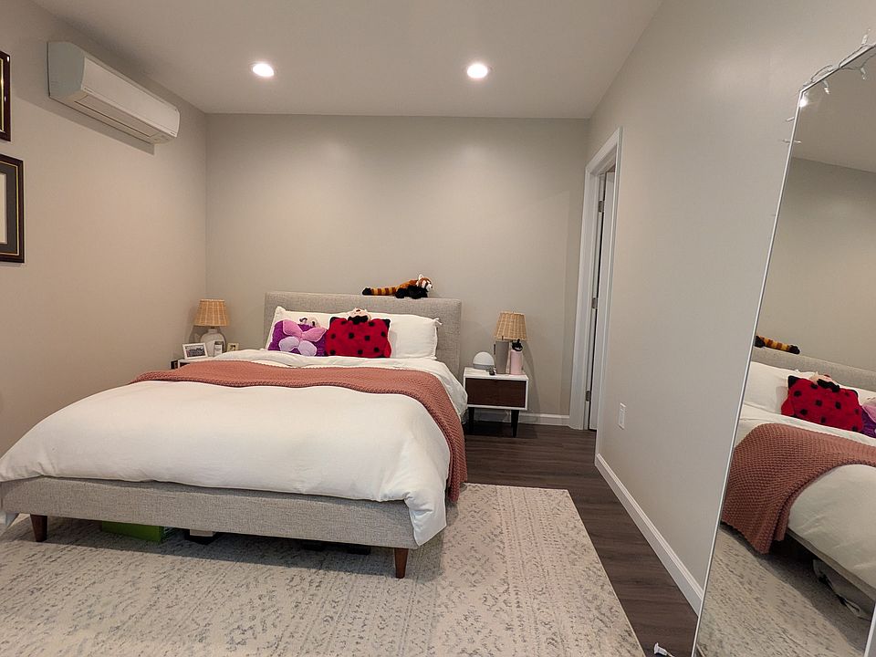 Large bedroom with an A/C unit