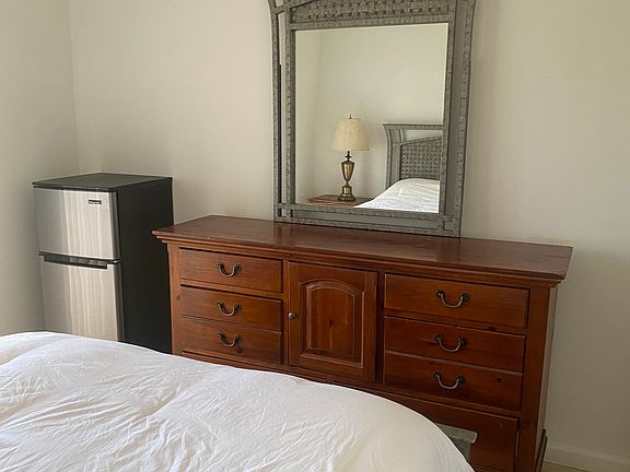 Bedroom 1 Queen Size with access to share balcony with roommate.