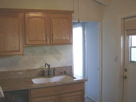 Remodeled kitchen with granite counters