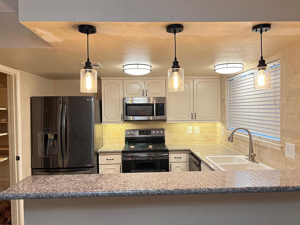 Kitchen with granite countertops