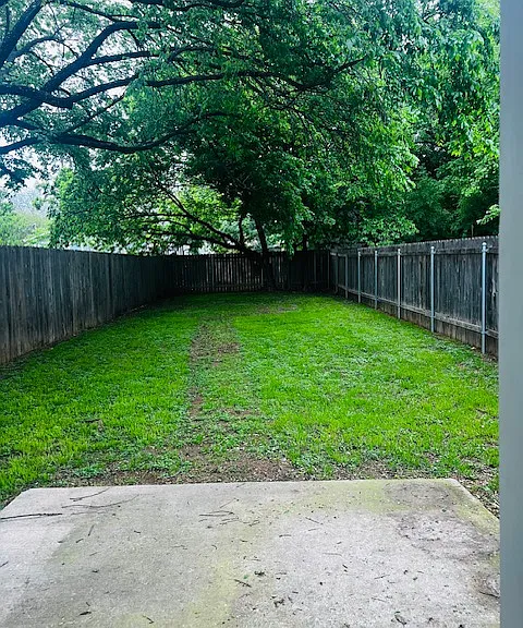 Large privacy-fenced backyard.