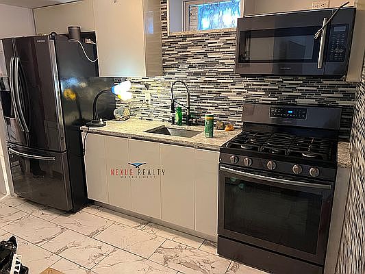 4th image of 66-41 Borden Ave #1