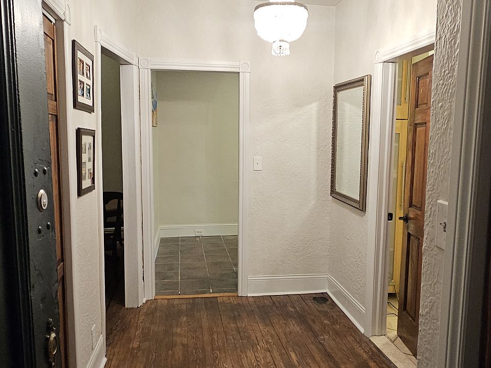 Foyer, Kitchen at end of foyer, bedroom and bathroom to the right, Living Room to the Left