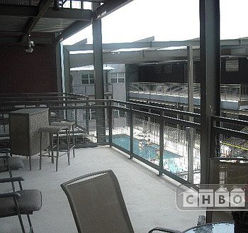 Huge balcony with side view of pool