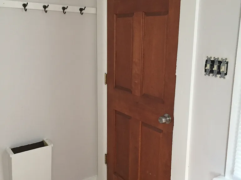 Kitchen Back door that leads to basement and outside