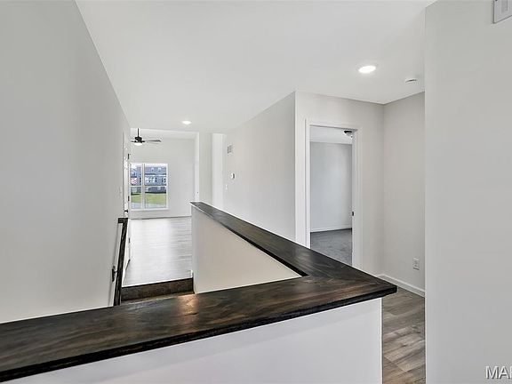 2nd image of 302 White Orchid Ct