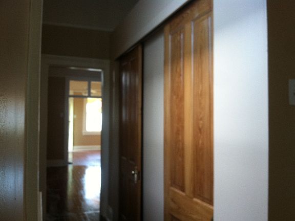 Hallway to kitchen - 2 full-size closets