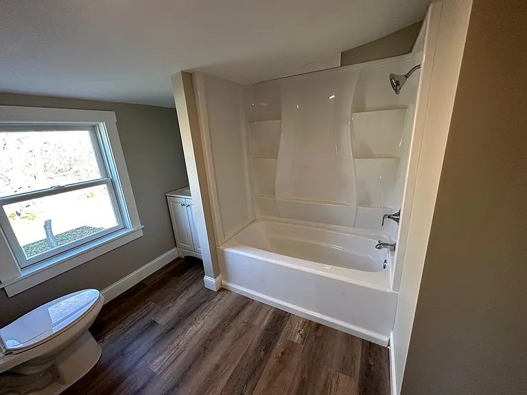 Upstairs bathroom, new tub/shower, toilet and vanity