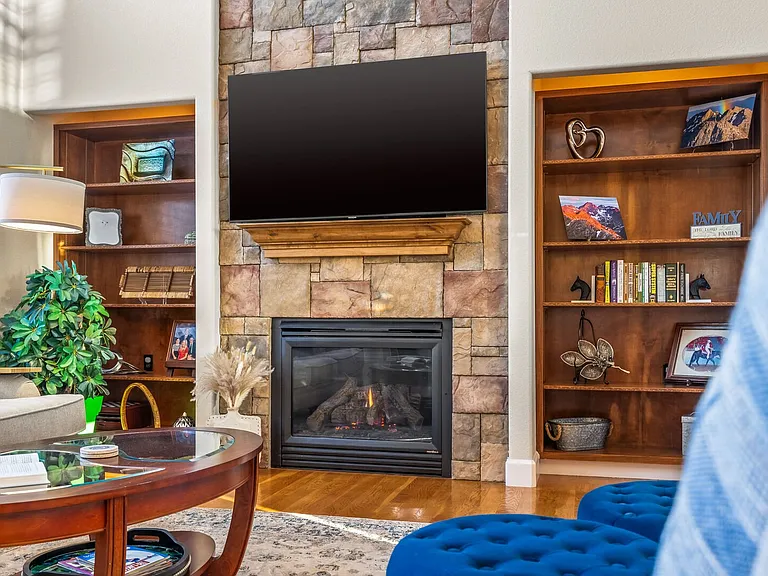 Main Level Living Room

Cozy up on those cold winter nights with the gas fireplace (there's a second one downstairs!)