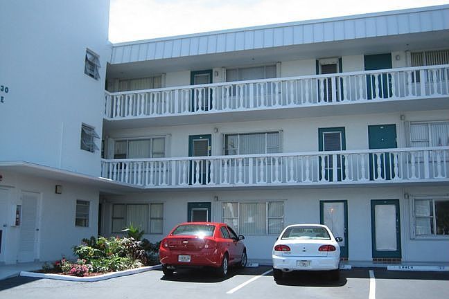 130 Doolen Ct #207 is directly above the red car.